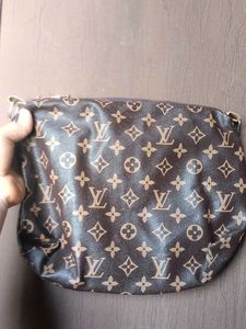 Louis Vuitton Pouch And Sling bag