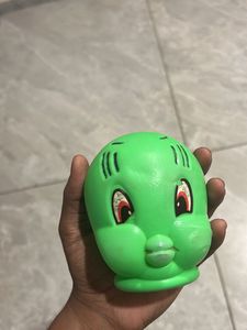 Green Squeeze Toy With Piggy Backing