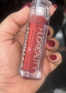 Huda Beauty FauxFiller lipgloss:- Bombshell