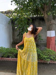 backless yellow flowy sundress