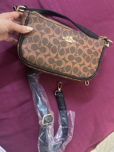 Coach Clutch sling Bag
