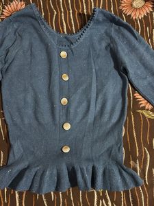 Blue long sleeve knit top