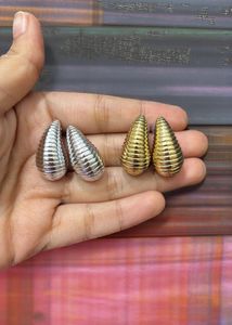 Silver And Golden Cashew Earrings💗💗