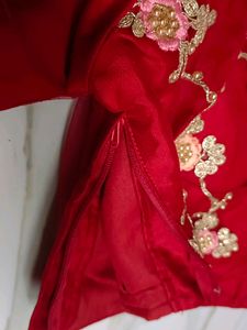 A Pretty Red Colour Net Embroidered Saree