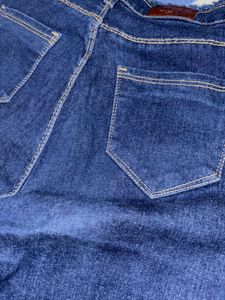 Ripped Dark Blue Denim Jeans