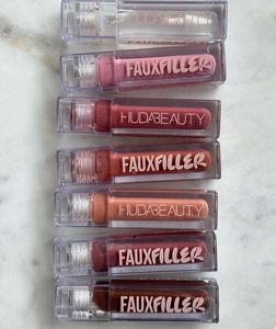 CHARLOTTE EYESHADOW PALETTE AND HUDA GLOSS