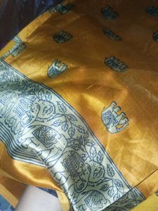 Ethnic Elephant pring yelloish orange saree...