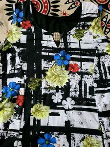Beautiful Sleeveless White And Black Floral Dress
