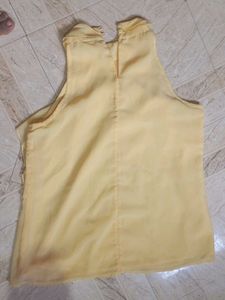 Yellow Sleeveless Ruffle Top