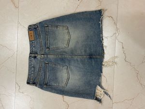 Distressed Denim Mini Skirt