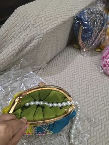 Olve Free Blue Potli Clutch With Pearl Handle