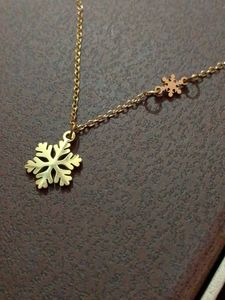 Gold Snowflake Pendant Necklace
