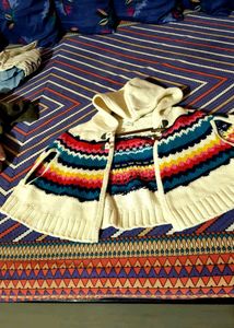 White With Colourful Poncho