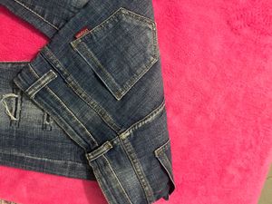 Ripped Blue Denim Jeans