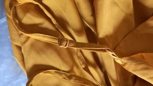 Today&#39;s Offer ₹150 Berrylush Women Solid Yellow Front Twist Knot Fit &amp; Flare Mini Dress For Women (Mustard Colour)