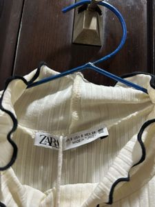 Ruffle Trim Knit Top