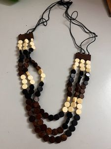 Long wooden three layered chain
