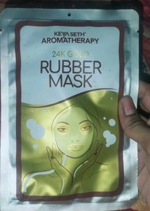 Keya Seth Rubber Mask. It is made by 24K gold dust