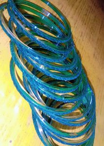 Green Colour Velvet Glass Bangles With A Pendant.