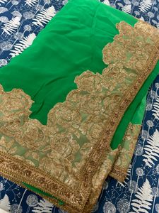 a green with golden heavy work