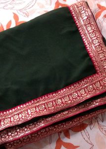 Elegant Green Saree with Pink Border