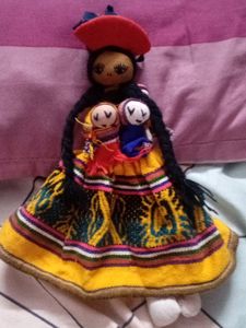 Handmade Doll Holding 3 Babies