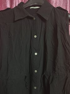 Sleeveless Black Button-Down Top