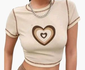 beige crop top with brown heart