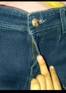 Ripped Blue Denim Jeans