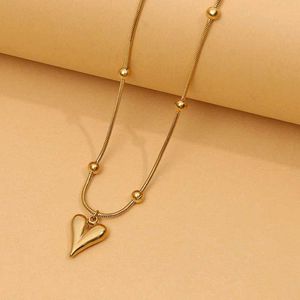 Gold Heart Pendant Necklace