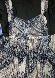 Patterned Dress with Unique Brooch