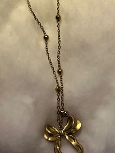 Gold Tone Bow Pendant Necklace
