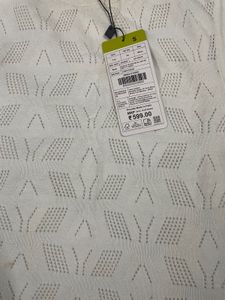 White Sleeveless Top