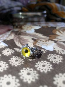 Uniquely Yellow Coloured Eye Silver Sword Ring