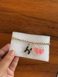 Bracelet with initial letter and real flower