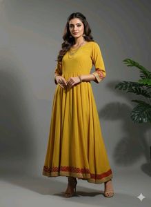 Mustard anarkali gown.💛
