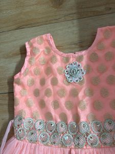 Peach Color Gown In Net For Girls