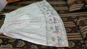 Off White Lehnga With Pink Dupatta