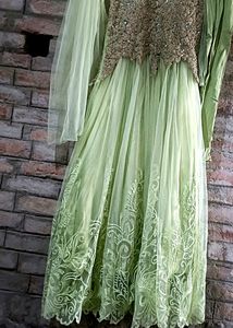 Heavy Embroidered Net Party Wear Long Gown With Du