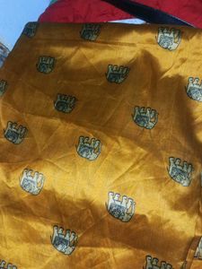 Ethnic Elephant pring yelloish orange saree...