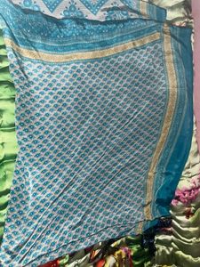 Turquoise Patterned pure crepe saree