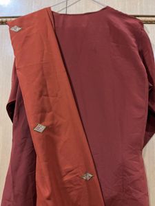 Rust maroon embroidered Kameez salwar suit