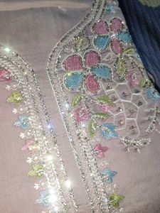 Unstitched Embroidered Dress Material