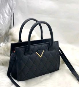 Chic Black Quilted Handbag
