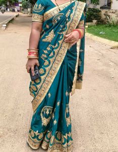 Elegant Teal Embroidered Saree