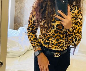 A Leopard Print Turtle Neck Fitted Top