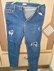 Ripped Blue Denim Jeans