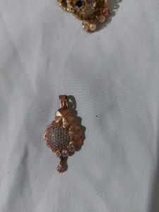 Golden Jhumka Earring And Pendant Charm