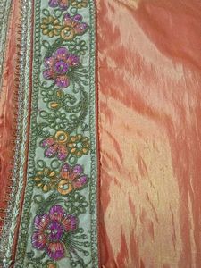 Elegant Unstitched Golden Blouse &amp; Orange Saree
