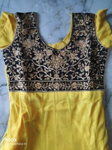 yellow net suit.